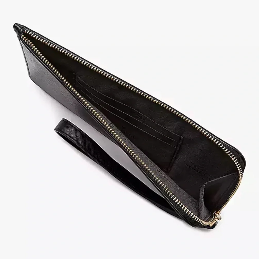 Kate Spade Lucy Medium L-Zip Wristlet
COLOR:
Black (Non Glitter)
NWT - Picture 2 of 16